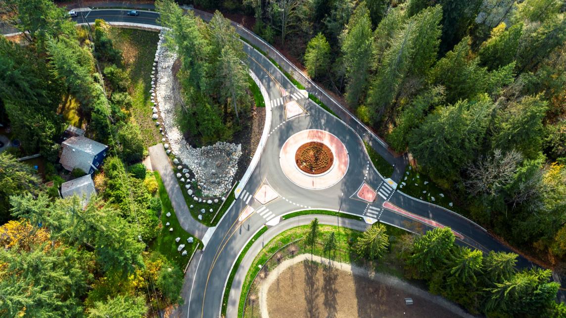 An aerial of a new, single lane roundabout showing the paths that connect to the intersection.