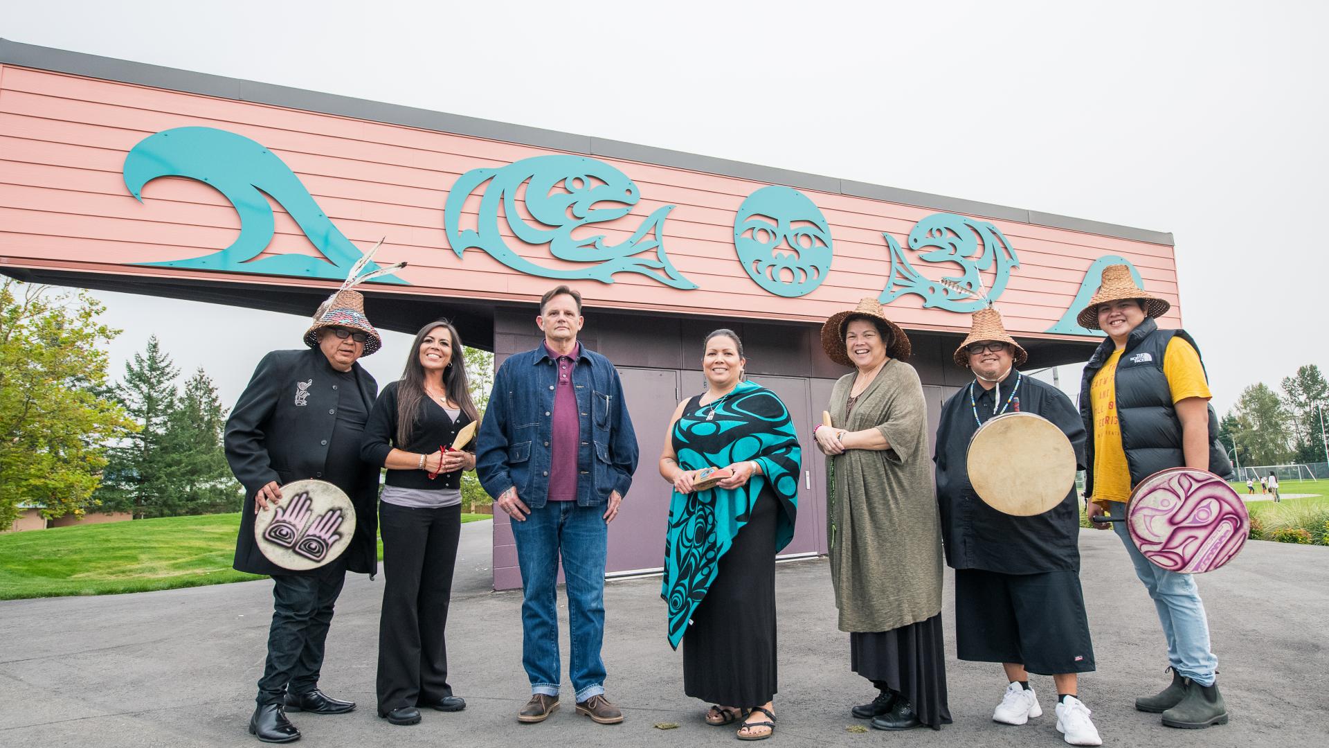 Art Installation of A Bears Feast at Telosky Stadium with Artist and Community Members in Front