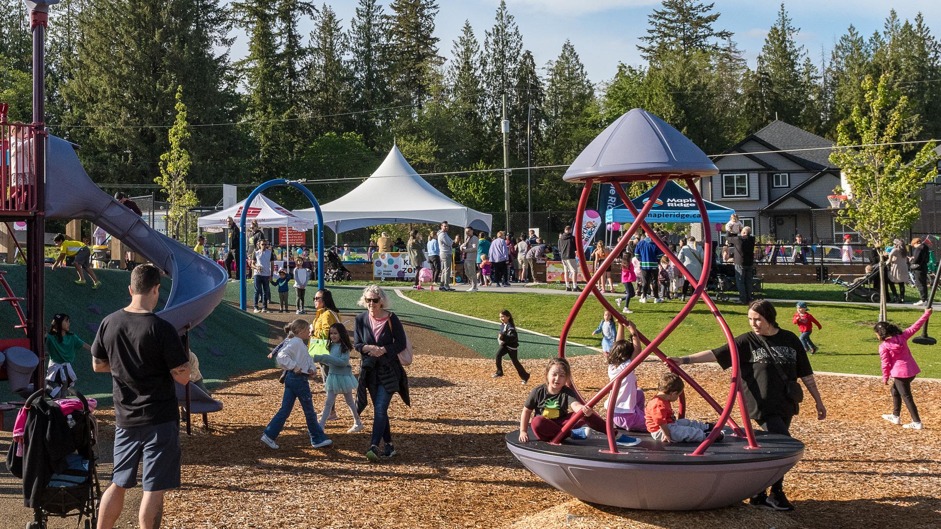 Families enjoy the playground together at Tsuyuki Park.