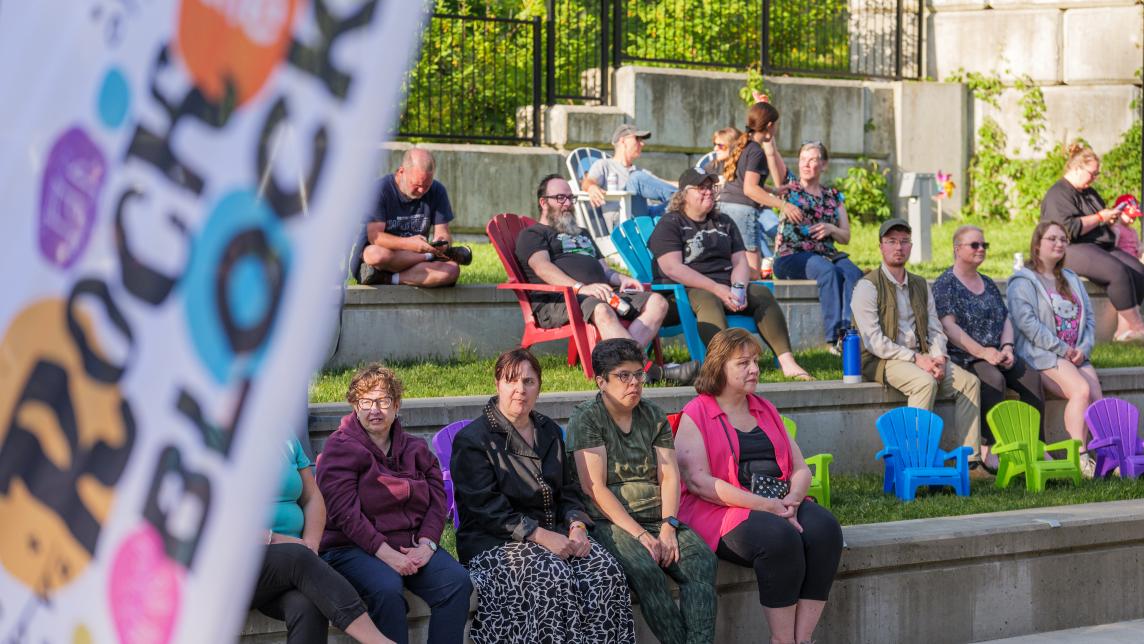 Crowd of People Outside Listening to Music at Rock the Block at Albion Community Centre