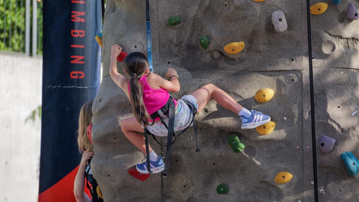 Little Girl Rock Climbing at Rock the Block at Albion Community Centre
