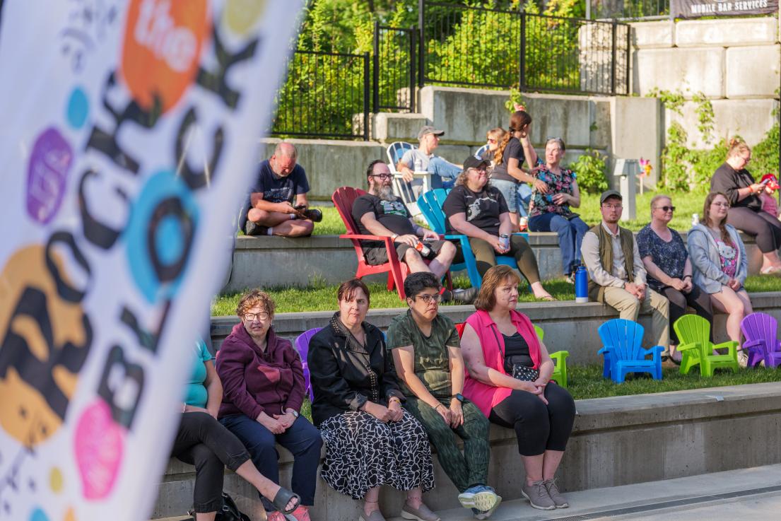 People Outside Listening to a Band at Rock the Block at Albion Community Centre