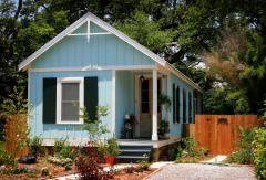 small blue carriage house