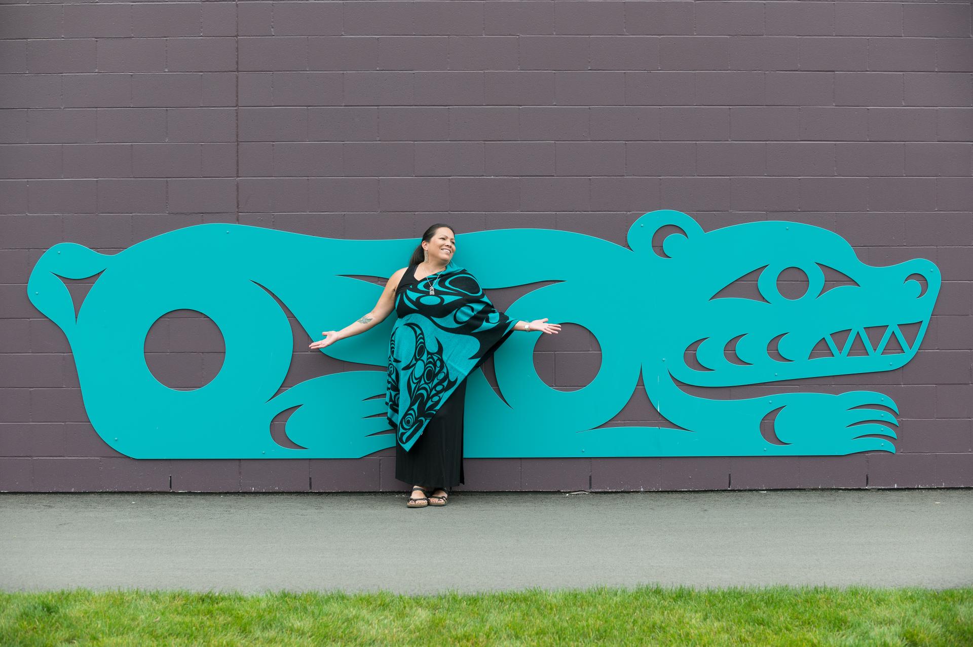 Artist Phyllis Atkins with her artwork installation at Telosky Stadium